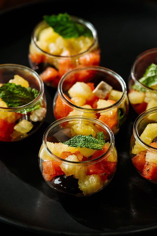 Corporate catering fruit appetizers served in glass jars by Green Mangos Catering